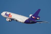 N392FE @ LAX - FedEx N392FE (FLT FDX3019) climbing out from RWY 25R enroute to Chicago O'Hare Int'l (KORD). - by Dean Heald