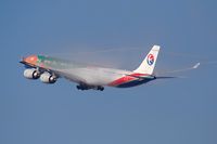 B-6055 @ LAX - China Eastern B-6055 Expo 2010 (FLT CES586) climbing out from RWY 25R, generating some dramatic condensation, enroute to Shanghai Pudong (ZSPD). - by Dean Heald