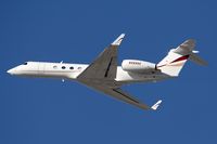 N888HE @ LAX - Harrah's 2001 Gulfstream G-V N888HE climbing out from RWY 25R. - by Dean Heald
