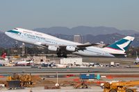 B-HOW @ LAX - Cathay Pacific B-HOW (FLT CPA885) climbing out from RWY 25R enroute to Hong Kong Int'l (VHHH). - by Dean Heald