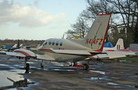 N414FZ @ EGHH - Cessna 414 Chancellor II - by Les Rickman
