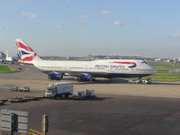 G-BNLI @ EGLL - British Airways 747-400 push out at terminal 4, Heathrow. - by John J. Boling