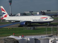 G-YMMC @ EGLL - British Airways 777 ariving terminal 4, Heathrow - by John J. Boling