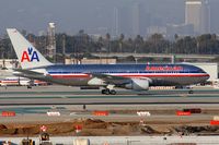 N327AA @ LAX - American Airlines N327AA (FLT AAL3) from John F Kennedy Int'l (KJFK) taxiing to the American terminal. - by Dean Heald