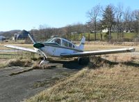 N16528 @ FWN - Tires flat, this 1973 Piper Cherokee Archer appears to have occupied its parking space for a long time. - by Daniel L. Berek