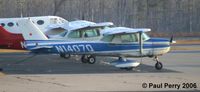 N1407Q @ ONX - A somewhat weary looking 150 at Currituck Airport - by Paul Perry