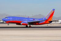 N485WN @ LAS - Southwest Airlines N485WN Southwest Loves Kidd's Kids touching down on RWY 25L. - by Dean Heald