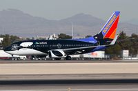 N713SW @ LAS - Southwest Airlines N713SW Shamu (FLT SWA1991) starting her takeoff roll on RWY 25R enroute to Nashville Int'l (KBNA). - by Dean Heald