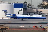 N748SK @ LAX - United Express (SkyWest Airlines) N748SK (FLT SKW6514) from Colorado Springs taxiing to Terminal 7 after arrival on the North complex. - by Dean Heald