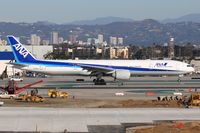 JA735A @ LAX - All Nippon Airways JA735SA (FLT ANA6) from Narita Int'l (RJAA) taxiing to the TBIT after arrival on the North complex. - by Dean Heald