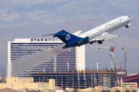 N685CA @ LAS - Champion Air N685CA (FLT CCP405) climbing out from RWY 01R, in front of the closed Stardust Hotel & Casino, enroute to Minneapolis St Paul Int'l (KMSP). - by Dean Heald