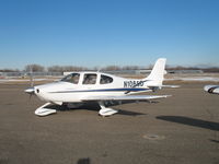 N106CD @ KMIC - Parked on the West side of Minneapolis Crystal, a low serial number Cirrus SR-20 - by Timothy Aanerud