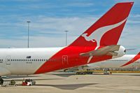 VH-OJU @ MEL - Parked in Melbourne - by Micha Lueck