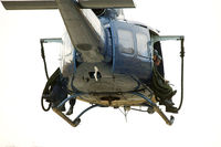 N5929Z - Bell UH-1H Huey Preparing Fast Rope Action - by Glenn Grossman