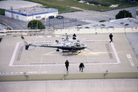 N223LA - Eurocopter AS 350 B2 SWAT Crew Detaching - by Glenn Grossman