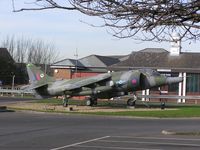 XV779 @ EGXT - Harrier GR3 guarding the gate at Wittering - by Simon Palmer