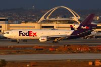 N399FE @ LAX - FedEx N399FE (FLT FDX3154) from Fort Worth Alliance (KAFW) about to exit RWY 25R after landing late in the day. - by Dean Heald