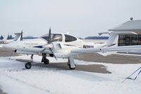 N435TS @ YXU - Parked in front of Diamond Flight Centre - by topgun3