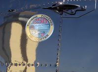 N9118F @ CMA - 1972 Hughes  369HS, Allison 250 Ser. Turboshaft 400 shp Turboshaft, Rolls Royce Allison engine logo (CMA's tower reflection on glossy paint) - by Doug Robertson