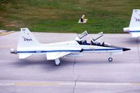 N918NA @ KCID - Taxiing by the control tower - by Glenn E. Chatfield