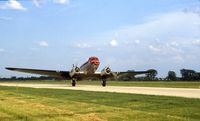 N47CE @ DPA -  taking off Runway 28 - by Glenn E. Chatfield