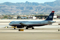 N647AW @ LAS - America West taxi to take-off - by John Little