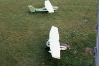 UNKNOWN @ DPA - ramp litter after severe storm tore planes from tie-downs - by Glenn E. Chatfield