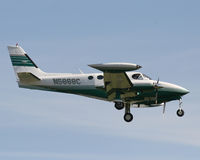 N5868C @ KSAC - Landing at Sacramento Executive - by Jim DeWitt