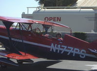 N177PS @ SZP - 2000 Aviat PITTS S-2C, Lycoming AEIO-540, strapping in - by Doug Robertson