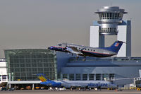 N229SW @ KLAS - United Express - SkyWest Airlines / 1995 Embraer EMB-120ER - by Brad Campbell