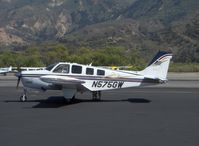 N575GW @ SZP - 2001 Raytheon Beech A36 BONANZA, Continental IO-550-B 300 Hp, wingtip tanks, loading golf clubs, etc - by Doug Robertson