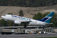 C-GWSI @ CYLW - Westjet Boeing 737-600 - by Yakfreak - VAP