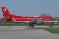 N404XJ @ YXU - Taxiing on Golf. - by topgun3