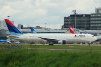 N198DN @ EGCC - Delta Air Lines - taxiing - by David Burrell