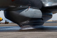 C-GHZI @ CYQF - Air Spray Lockheed Electra testing its waterdrop system - by Yakfreak - VAP