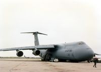 66-8306 @ CID - C-5A at the base of the control tower - by Glenn E. Chatfield