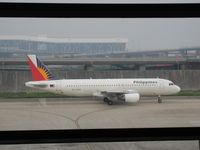 RP-C3228 @ ZSPD - Philippine Airlines Airbus A320 leaving gate - by Ken Wang