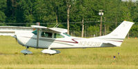 N3432R @ ESN - Skylane taxiing to 22. - by Stephen Amiaga