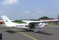 G-CTFF @ EGTB - Cessna T206H on static display at Aero Expo 2007 - by Simon Palmer
