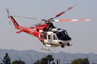 N304FD @ VNY - LA City Fire 4 departing the helipad. - by Dean Heald
