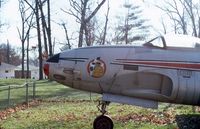 45-8357 - At Phillips Park in Aurora, IL.  Later replaced by an F-105.  Close-up of the nose insignia. - by Glenn E. Chatfield