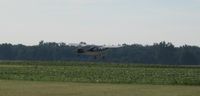 N1120E @ O74 - Landing at Mount Victory, OH - by Bob Simmermon