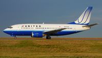 N933UA @ DEN - Taxiing to hanger. - by Francisco Undiks