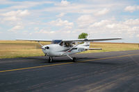 N74DW @ KFTG - EAA Fly-In- 2006 - by John Little