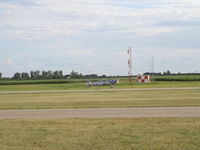 N192CC @ KLVN - Extra 300 landing Runway 30. - by Mitch Sando