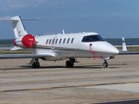N21BD @ OQU - Learjet N21BD poses in the sun at Quonset Point, Rhode Island - by Geoff Cook