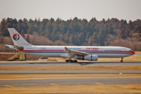 B-6119 @ NRT - Just touched down, thrust reversers deployed - by Micha Lueck