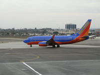 N229WN @ LAX - Southwest 737-7H4 in new colors taxying @ LAX - by Steve Nation