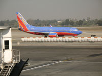 N405WN @ LAX - Southwest 737-7H4 in new colors taxying @ LAX - by Steve Nation
