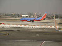 N405WN @ LAX - Southwest 737-7H4 in new colors rolling @ LAX - by Steve Nation